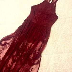 Small sexy, lace maroon dress. Sheer lace over legs and back. Sexy!
